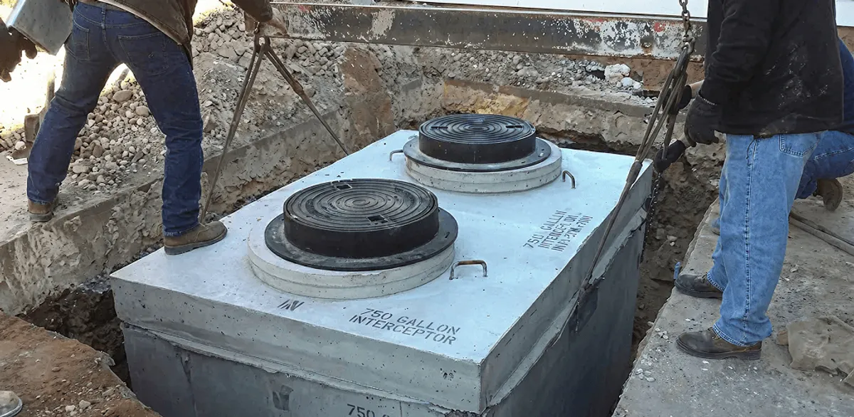 Grease trap installation for a commercial property drainage system in Ann Arbor, MI