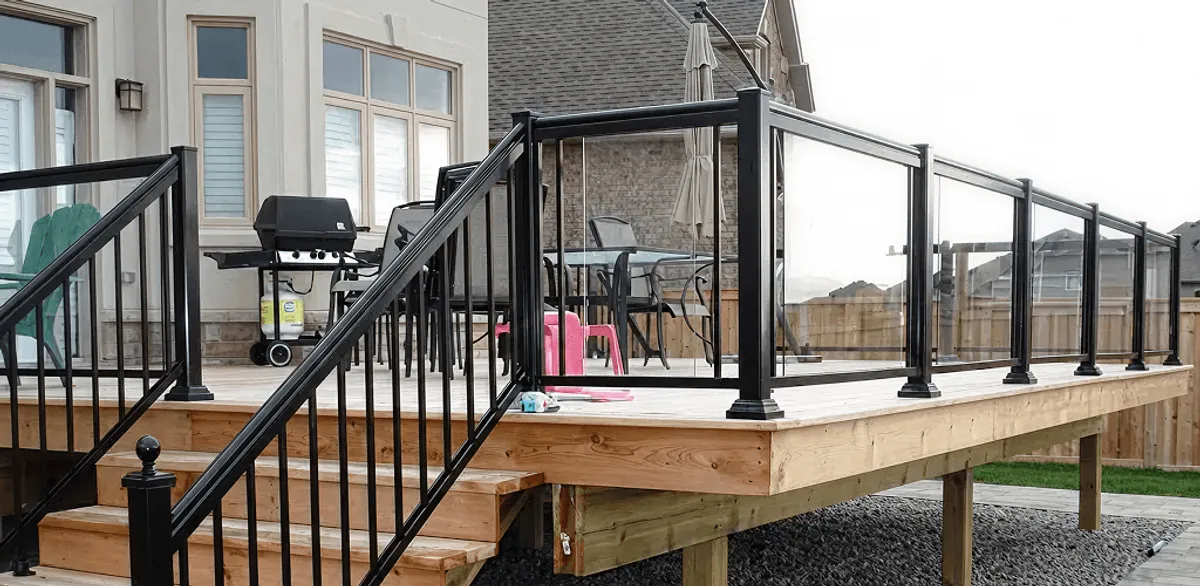Handrail installation on a deck staircase for safety and code compliance in Ann Arbor, MI